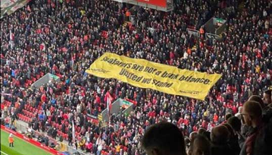 Liverpool FC supporters fly a Nautilus banner in solidarity with sacked P&O Ferries seafarers. Image: Nautilus International Image:Liverpool FC supporters fly a Nautilus banner in solidarity with sacked P&O Ferries seafarers. Image: Nautilus International