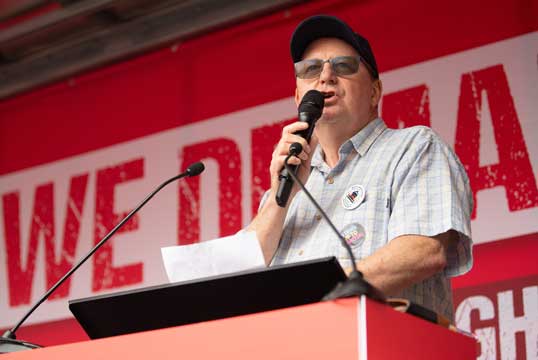 Nautilus general secretary Mark Dickinson outlines the Union's Fair Ferries campaign at a TUC 'We Demand Better' rally in June 2022. Image: Anna Gordon Image:Nautilus general secretary Mark Dickinson outlines the Union's Fair Ferries campaign at a TUC 'We Demand Better' rally in June 2022. Image: Anna Gordon