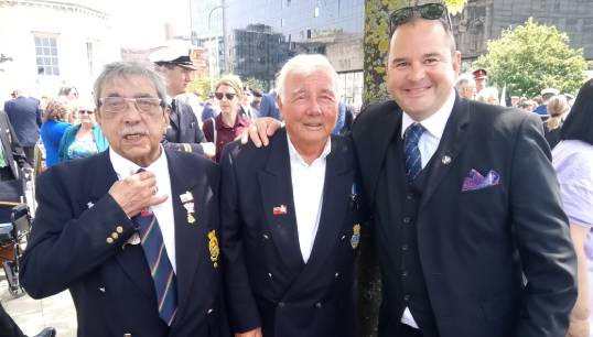 Andrew Jones (right) at Battle of the Atlantic 80th anniversary commemorations . He is pictured with, from left, Stu Attick and Jimmy Allenby (ex Cunard), members of the Liverpool Merchant Navy Association which meets regularly at Mariners' Park. Mr Attick and Mr Allenby laid the wreaths in the BoA80 Drumhead service at the Liverpool's Pier Head before the March of the Medals, also attended by some Park residents. Image: Nautilus International Image:Andrew Jones (right) at Battle of the Atlantic 80th anniversary commemorations . He is pictured with, from left, Stu Attick and Jimmy Allenby (ex Cunard), members of the Liverpool Merchant Navy Association which meets regularly at Mariners' Park. Mr Attick and Mr Allenby laid the wreaths in the BoA80 Drumhead service at the Liverpool's Pier Head before the March of the Medals, also attended by some Park residents. Image: Nautilus International