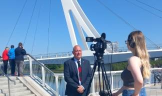 Mr Lindsay being interviewed by local media. Image:Mr Lindsay being interviewed by local media.