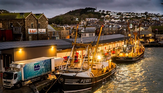 2020's Ultimate Sea View winner Laurence Hartwell impressed with his photograph of beam trawlers landing to the fish market at night. Image: Shipwrecked Mariners' Society Image:2020's Ultimate Sea View winner Laurence Hartwell impressed with his photograph of beam trawlers landing to the fish market at night. Image: Shipwrecked Mariners' Society