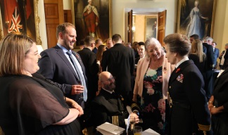 HRH, The Princess Royal chats to Captain Mooney and his family at the reception. Image: HRH, The Princess Royal chats to Captain Mooney and his family at the reception.