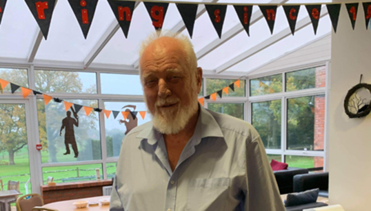 Springbok Estate resident Peter Castle enjoying the low-key residents' bubble celebrations of the Care Ashore centenary Image:Springbok Estate resident Peter Castle enjoying the low-key residents' bubble celebrations of the Care Ashore centenary