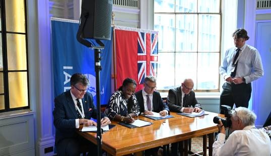 Rear Admiral Iain Lower (left) and Commodore Mike Bullock (right) during the signing of a Memorandum of Understanding between Trinity House, the Department for Transport (DfT), the IALA World Wide Academy and the Northern Lighthouse Board (NLB). Also present are Lola Fadina, director of maritime at the DfT and Vice Admiral Vincent Denamur, dean of the Academy. Image: Trinity House
Image:Rear Admiral Iain Lower (left) and Commodore Mike Bullock (right) during the signing of a Memorandum of Understanding between Trinity House, the Department for Transport (DfT), the IALA World Wide Academy and the Northern Lighthouse Board (NLB). Also present are Lola Fadina, director of maritime at the DfT and Vice Admiral Vincent Denamur, dean of the Academy. Image: Trinity House