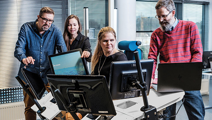 Rolls-Royce's new team members – two navigating officers, an engineer officer and a marine pilot – are based at the company's Remote Operating Centre in Finland Image:Rolls-Royce's new team members – two navigating officers, an engineer officer and a marine pilot – are based at the company's Remote Operating Centre in Finland