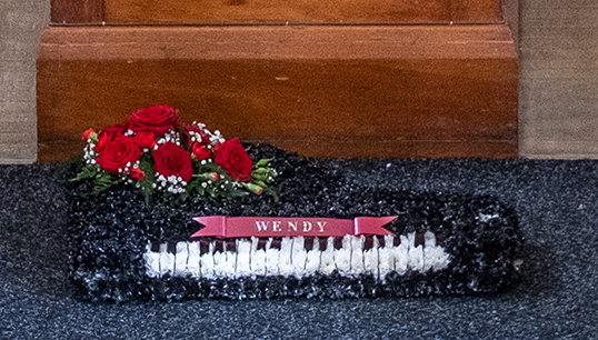 Floral tribute in the shape of Wendy's keyboard: black patent sprayed on white Michaelmas Daisies. Image: Jason Shipley Image:Floral tribute in the shape of Wendy's keyboard: black patent sprayed on white Michaelmas Daisies. Image: Jason Shipley