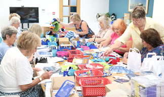 Southampton Sailors Society volunteers packing in pre-pandemic days Image:Southampton Sailors Society volunteers packing in pre-pandemic days