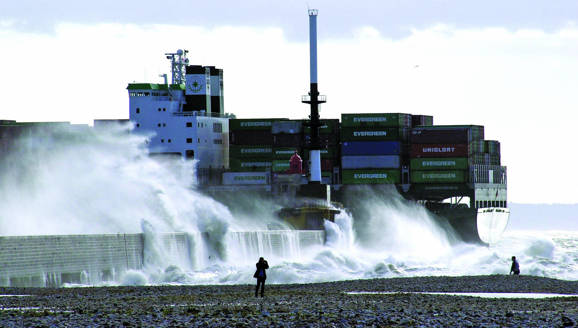 The containership Ever Unison enters the French port of Le Havre in stormy conditions.Pilots and harbour authorities are increasingly concerned about the risks of wind effects on large containerships and passenger vessels Image: Eric Houri Image:The containership Ever Unison enters the French port of Le Havre in stormy conditions.Pilots and harbour authorities are increasingly concerned about the risks of wind effects on large containerships and passenger vessels Image: Eric Houri