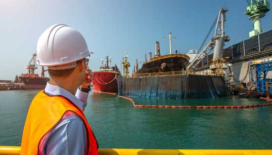 A Port State water pollution inspection. Image: Getty Images Image:A Port State water pollution inspection. Image: Getty Images