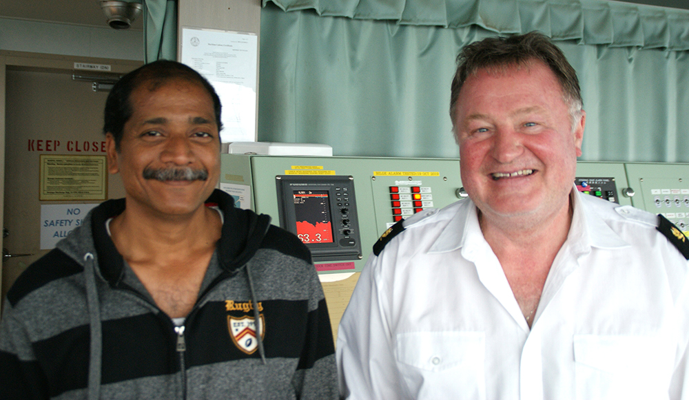 Title: deepsea pilot captain Paul Lanaghan and Cygnus Leader master Capt Subra Arumugam (left) Title: deepsea pilot captain Paul Lanaghan and Cygnus Leader master Capt Subra Arumugam (left)