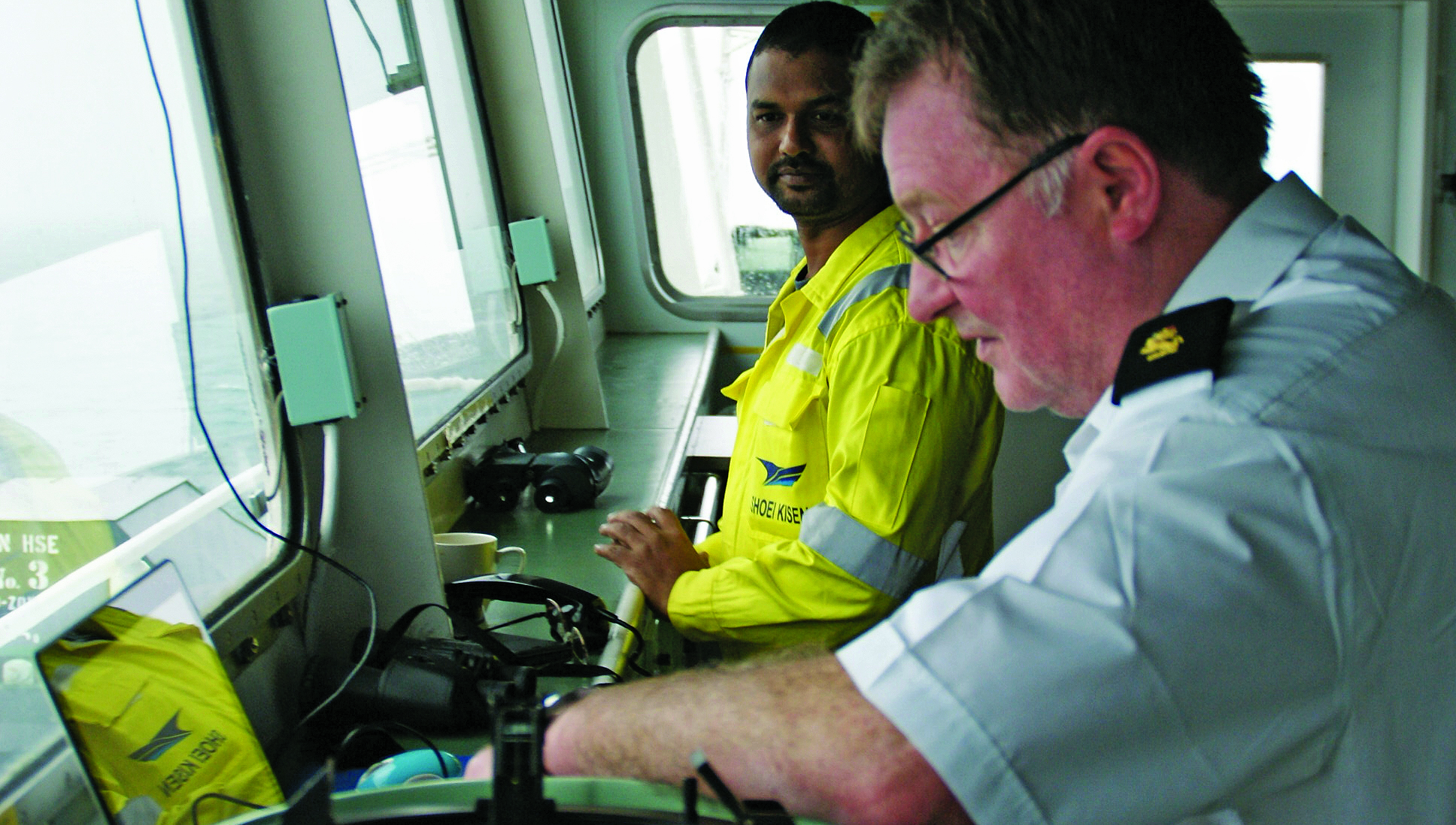 Capt Lanaghan consults his personal pilot unit as the car carrier Cygnus Leader transits the Channel traffic separation scheme. All images: Andrew Linington Image:Capt Lanaghan consults his personal pilot unit as the car carrier Cygnus Leader transits the Channel traffic separation scheme. All images: Andrew Linington