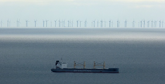 Ship at anchor on the east coast of Anglesey with the massed ranks of Gwynt y Môr offshore wind farm across the bay. Source: Wikimedia Commons Image:Ship at anchor on the east coast of Anglesey with the massed ranks of Gwynt y Môr offshore wind farm across the bay. Source: Wikimedia Commons