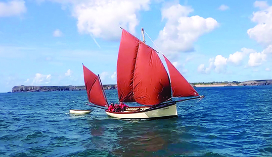 A replica Tenby Lugger used by the West Wales Maritime Heritage Society to demonstrate the sailing techniques of 19th century fishermen Image: West Wales Maritime Heritage Society Image:A replica Tenby Lugger used by the West Wales Maritime Heritage Society to demonstrate the sailing techniques of 19th century fishermen Image: West Wales Maritime Heritage Society