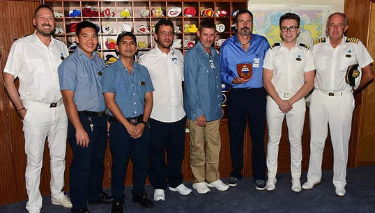 Max Bingle (second from right) with the three crew who were rescued as well as colleagues and the master of the cruiseship. Image: Princess Cruises Image:Max Bingle (second from right) with the three crew who were rescued as well as colleagues and the master of the cruiseship. Image: Princess Cruises