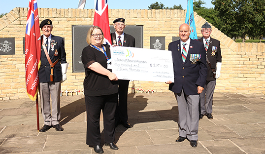 Nautilus member Keith Thompson presents a cheque for £215 raised by his veterans' group to Sarah Oakden-Nancarrow of the National Memorial Arboretum Image:Nautilus member Keith Thompson presents a cheque for £215 raised by his veterans' group to Sarah Oakden-Nancarrow of the National Memorial Arboretum