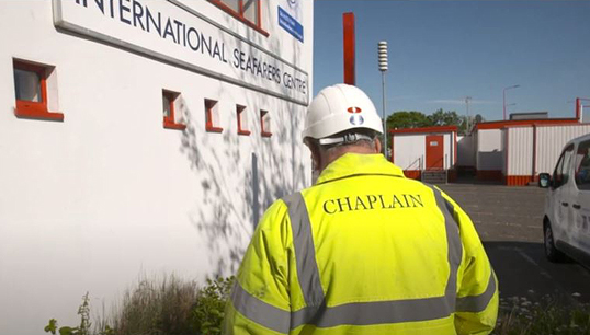 A chaplain approaches an International Seafarers' Centre Image: SIRC film Image:A chaplain approaches an International Seafarers' Centre Image: SIRC film