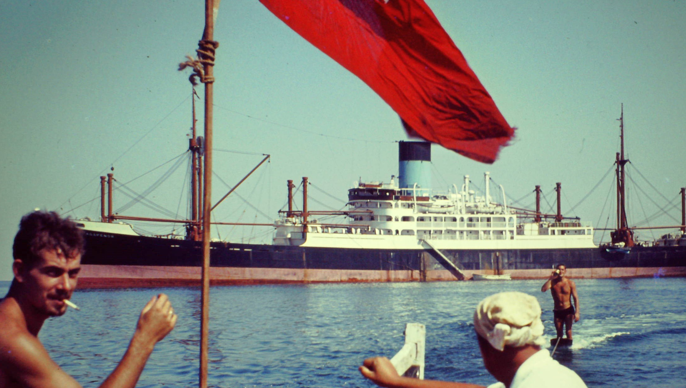 'Surfboarding' on tow behind a lifeboat, with the Agapenor in the background. All images: Peter Flack Image:'Surfboarding' on tow behind a lifeboat, with the Agapenor in the background. All images: Peter Flack