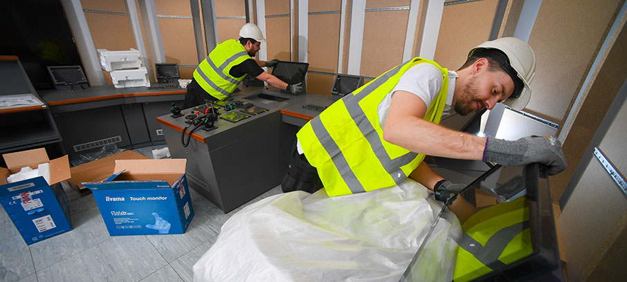 The Wärtsilä team installing console screens for the new simulators Image:The Wärtsilä team installing console screens for the new simulators