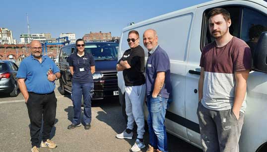 The SeaFit Programme is a joint initiative between Seafarers Hospital Society (SHS) and the Fishermen's Mission and includes face to face UK quayside health events with outreach vans. Pictured is Fishermen's Mission area officer – South East England Ruth Charles (middle) with some fishermen during a health event. Image: SHS Image:The SeaFit Programme is a joint initiative between Seafarers Hospital Society (SHS) and the Fishermen's Mission and includes face to face UK quayside health events with outreach vans. Pictured is Fishermen's Mission area officer – South East England Ruth Charles (middle) with some fishermen during a health event. Image: SHS