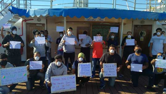 Cruise crew on the Astoria who went on a hunger strike after being stuck on board their vessel without pay. Image:Cruise crew on the Astoria who went on a hunger strike after being stuck on board their vessel without pay.