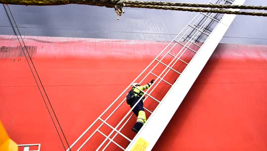The fleet-wide gangway-up order forces civilian seafarers to stay onboard all US government-owned/government-operated vessels, as well as vessels operated under MSC contracts, suspending crew shore leave worldwide. Image: Danny Cornelissen Image:The fleet-wide gangway-up order forces civilian seafarers to stay onboard all US government-owned/government-operated vessels, as well as vessels operated under MSC contracts, suspending crew shore leave worldwide. Image: Danny Cornelissen