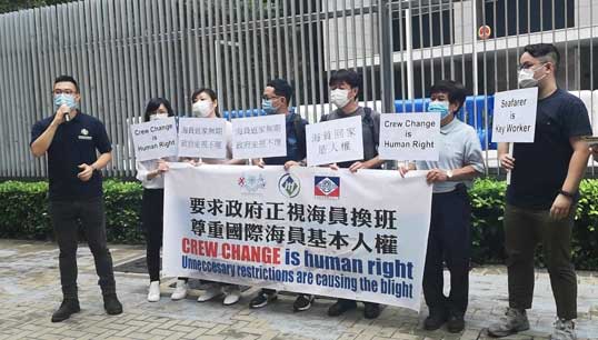 Hong Kong ITF inspector Jason Lam explains the petition demands to the press with Union representatives. Image:Hong Kong ITF inspector Jason Lam explains the petition demands to the press with Union representatives.