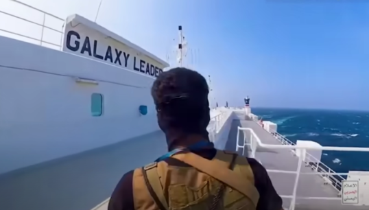 A fighter from Yemen's Houthi movement onboard the vessel during the hijacking operation. Image: Houthi press release Image:A fighter from Yemen's Houthi movement onboard the vessel during the hijacking operation. Image: Houthi press release