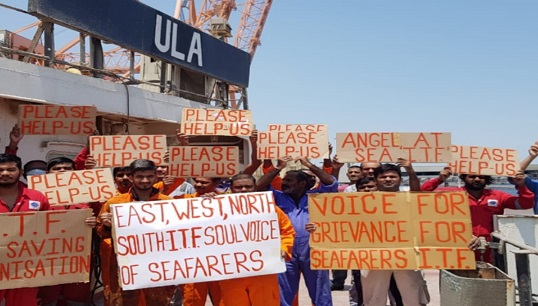 The crew of the MV ULA made signs asking the ITF to become involved with their case. After two years, they are finally going home. Image: ITF Image:The crew of the MV ULA made signs asking the ITF to become involved with their case. After two years, they are finally going home. Image: ITF