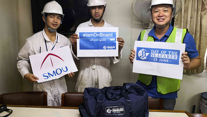 Seafarers on the containership Mathu Bhum in Singapore receive their gift hampers Image:Seafarers on the containership Mathu Bhum in Singapore receive their gift hampers
