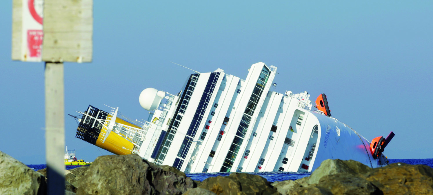 The capsized Costa Concordia before salvage operations began. Image:The capsized Costa Concordia before salvage operations began.
