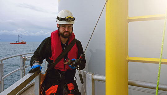 Offshore worker on wind turbines. Image: Getty Images Image:Offshore worker on wind turbines. Image: Getty Images