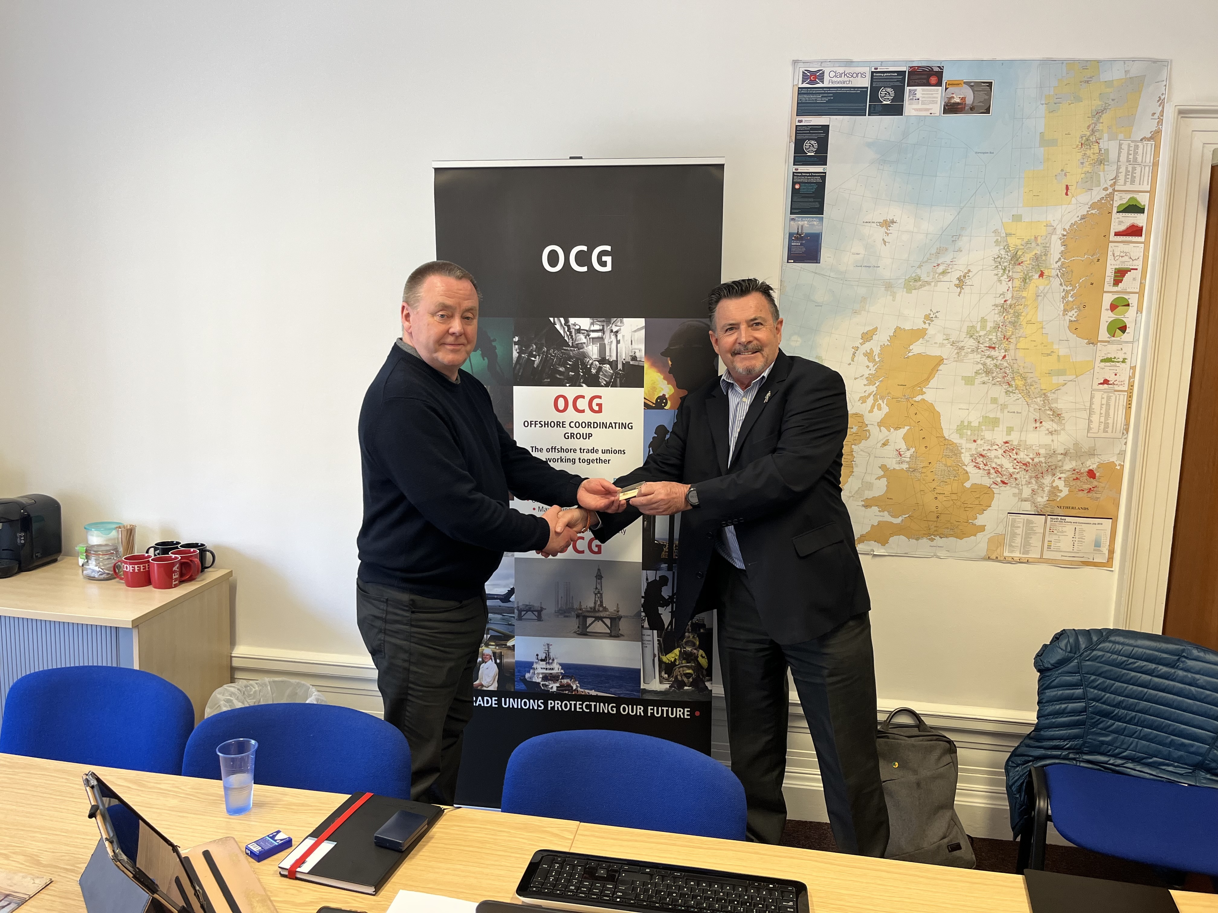 Jake Molloy, left, was presented with a memento by Nautilus national organiser Steve Doran. Image:Jake Molloy, left, was presented with a memento by Nautilus national organiser Steve Doran.