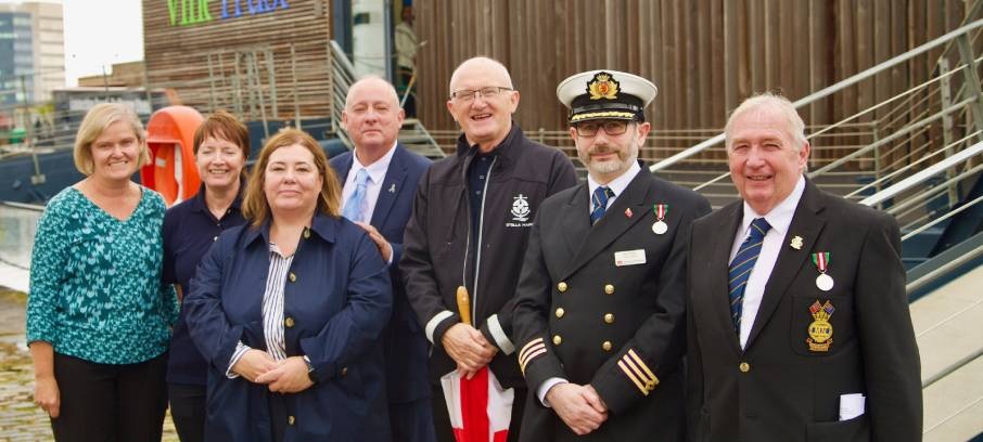 Union officials attending an event after the Leith service on the Vine Trust Tom Dunn barge were: Nautilus Council member Allan Dickson MNM (2nd from right), Nautilus Welfare Fund caseworker Iain Lindsay (4th from left), and Nautilus ITF inspector Helen Meldrum (3rd from left). Image: S Hurst Image:Union officials attending an event after the Leith service on the Vine Trust Tom Dunn barge were: Nautilus Council member Allan Dickson MNM (2nd from right), Nautilus Welfare Fund caseworker Iain Lindsay (4th from left), and Nautilus ITF inspector Helen Meldrum (3rd from left). Image: S Hurst