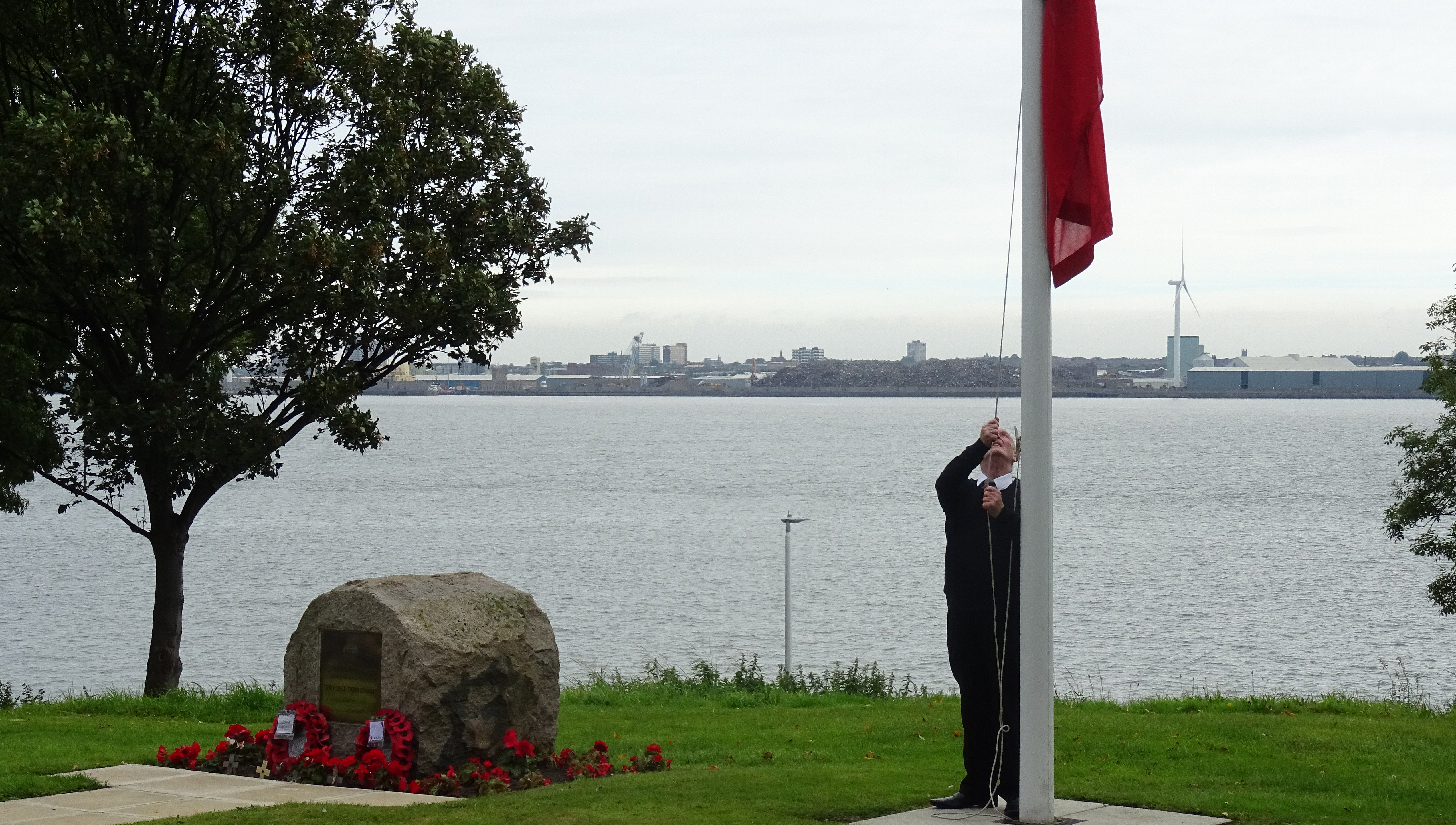 Flag raising ceremonies are held beside the Memorial Stone on the Nautilus Welfare Fund's Mariners' Park Estate in Wallasey, UK. Image: Nautilus International Image:Flag raising ceremonies are held beside the Memorial Stone on the Nautilus Welfare Fund's Mariners' Park Estate in Wallasey, UK. Image: Nautilus International