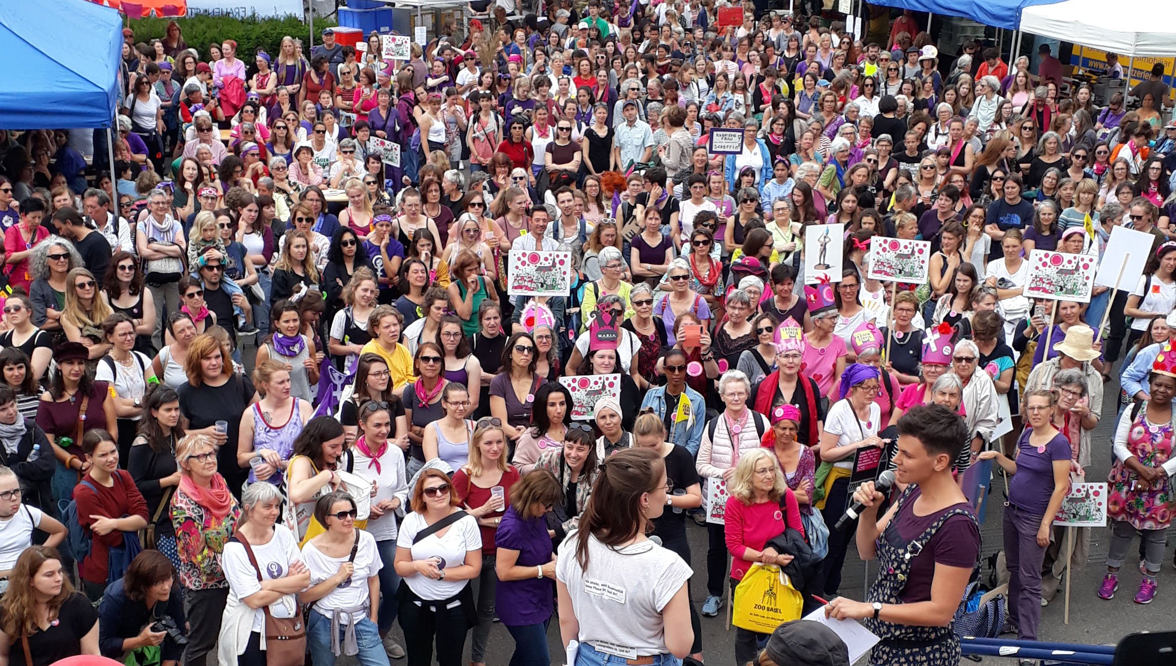 A demonstration in Theaterplatz in Basel held during the Swiss women's strike. Image:A demonstration in Theaterplatz in Basel held during the Swiss women's strike.