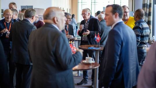 David Appleton (foreground at right), head of the Union's Professional and Technical Forum, mingles with members during a coffee break at the October 2023 Nautilus General Meeting. Image: Brad Wakefield Image:David Appleton (foreground at right), head of the Union's Professional and Technical Forum, mingles with members during a coffee break at the October 2023 Nautilus General Meeting. Image: Brad Wakefield