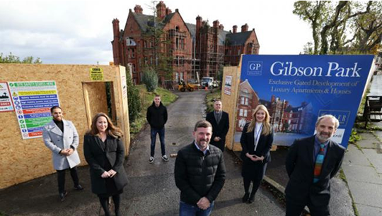 Nautilus Welfare Fund's Mick Howarth (front right) with representatives from Prospect Capital, Mason Verdi and Karl Tatler at the entrance to Gibson Park. Image:Nautilus Welfare Fund's Mick Howarth (front right) with representatives from Prospect Capital, Mason Verdi and Karl Tatler at the entrance to Gibson Park.