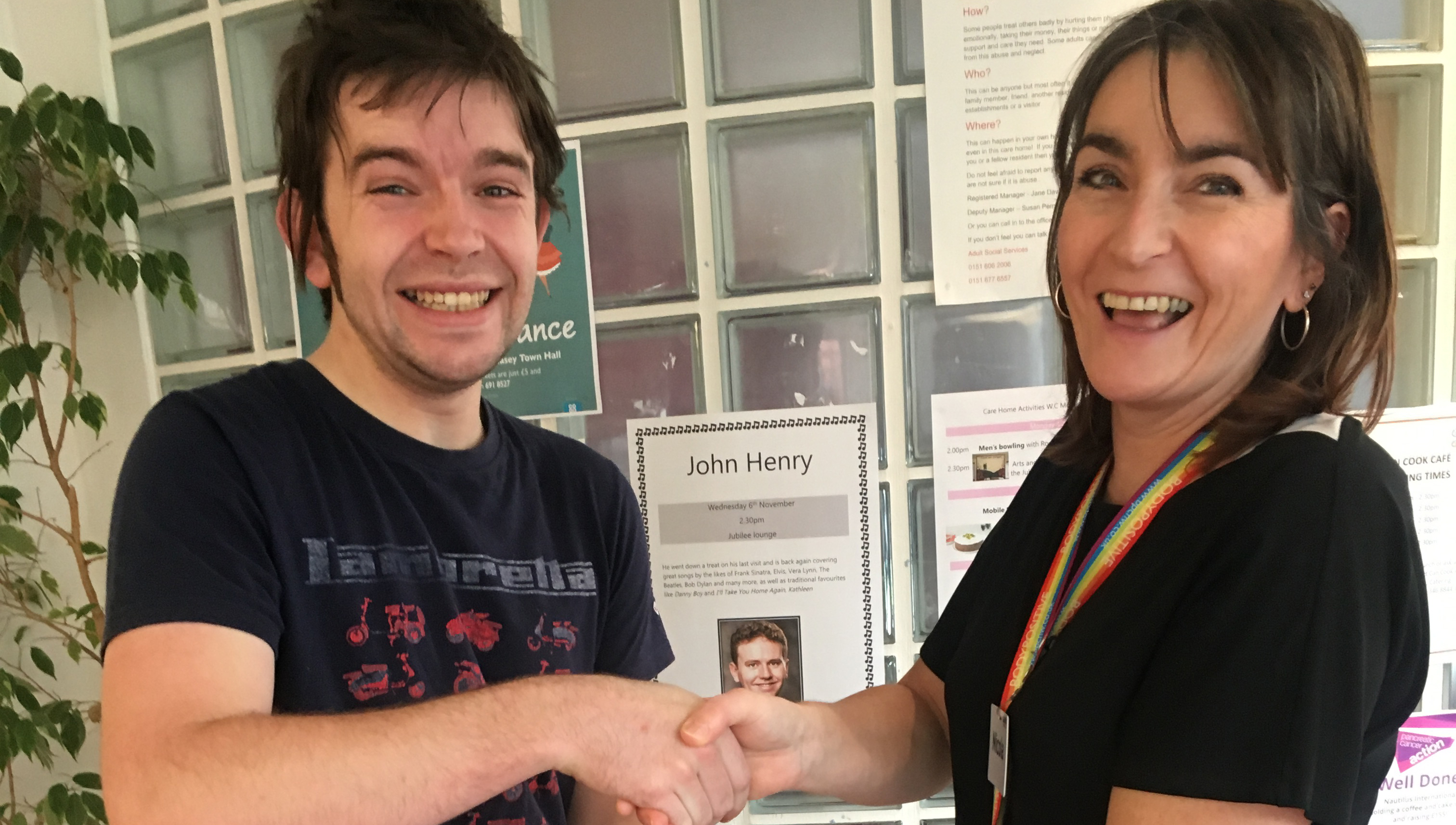 Connor Dunphy is congratulated on his welfare fundraising efforts by Nautilus Care Home activities co-ordinator Nicola Burns. Image:Connor Dunphy is congratulated on his welfare fundraising efforts by Nautilus Care Home activities co-ordinator Nicola Burns.