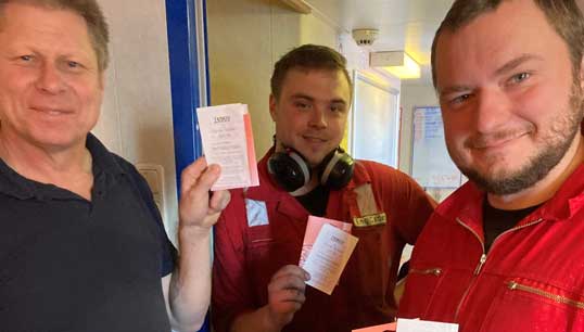 Seafarers with the free phone SIM card top-ups they received from Stella Maris. Image: Stella Maris Image:Seafarers with the free phone SIM card top-ups they received from Stella Maris. Image: Stella Maris